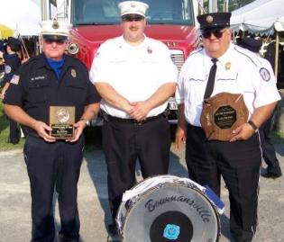 Bill and Carl win awards, Tommy proud